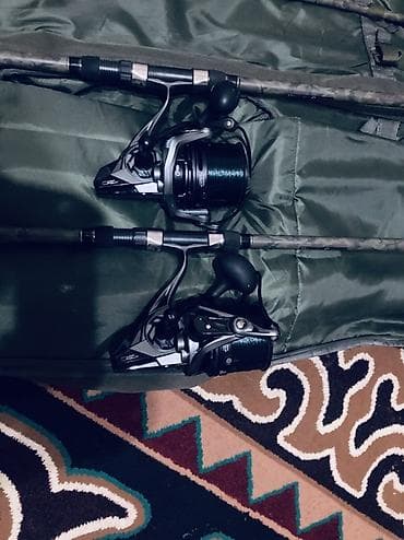 рюкзак охотничий: Карповый комплект: удилища + большие безынерционные катушки Состав: - — 2