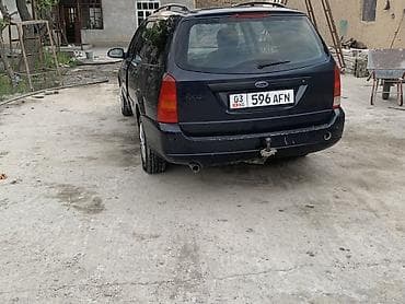 mini coper: Ford Focus: 2001 г., 1.8 л, Механика, Газ, Универсал — 5
