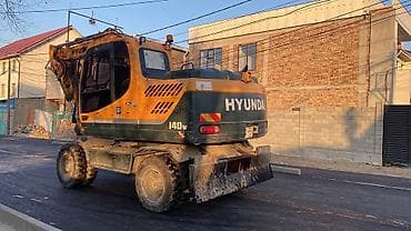 jon deer: Экскаватор, Hyundai, Колесный — 4