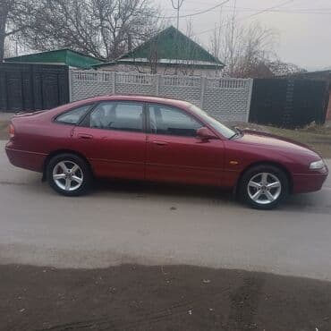 механика авто: Mazda Cronos: 1993 г., 1.8 л, Механика, Бензин, Седан — 2