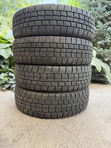 65: Шины 155 / 65 / R 13, Зима, Б/у, Комплект, Легковые, Япония, DUNLOP — 1