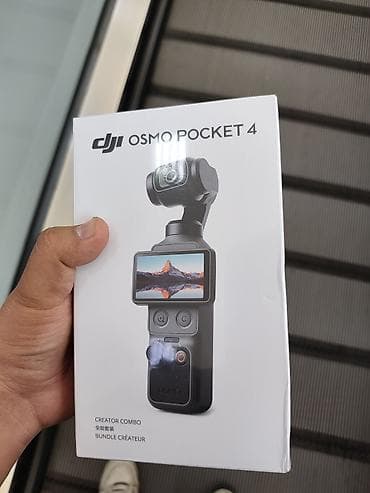 Видеокамеры: Портативная камера DJI Osmo Pocket 4 в комплектации Creator Combo — 1