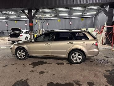 Mazda 6: 2004 г., 2 л, Автомат, Бензин, Универсал — 4