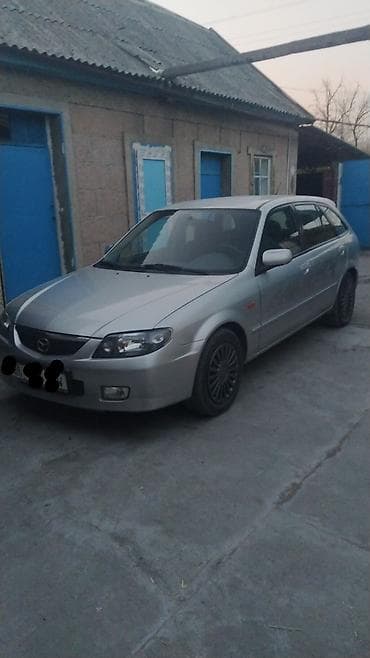 mazda 3: Mazda 323: 2002 г., 1.6 л, Механика, Бензин, Универсал — 2