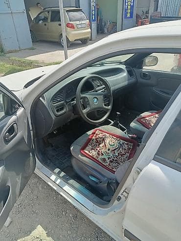 домик авто: Daewoo Lanos: 1999 г., 1.5 л, Механика, Бензин, Седан — 4