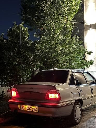 тонировка продажа: Услуги тонировки автомобилей. На фото показан процесс выполнения — 2