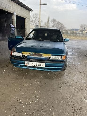 Продается легковой автомобиль седан (4 двери), темно-зеленый металлик