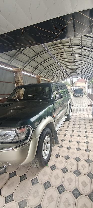 сидушка на самокат: Nissan Patrol: 1999 г., 3 л, Дизель, Внедорожник — 2