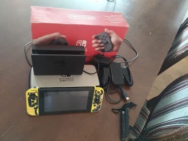 медиа приставка для телевизора: Игровая консоль Nintendo Switch, известная своей универсальностью — 1