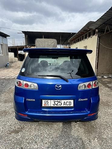 спорт глушитель: Mazda Demio: 2003 г., 1.5 л, Механика, Бензин, Хэтчбэк — 4