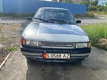 авто жак: Mazda 323: 1989 г., 1.5 л, Кол менен иштөөчү, Бензин, Седан — 5
