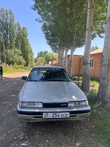 чистка ваты: Mazda 626: 1989 г., 0.2 л, Механика, Бензин, Седан — 1