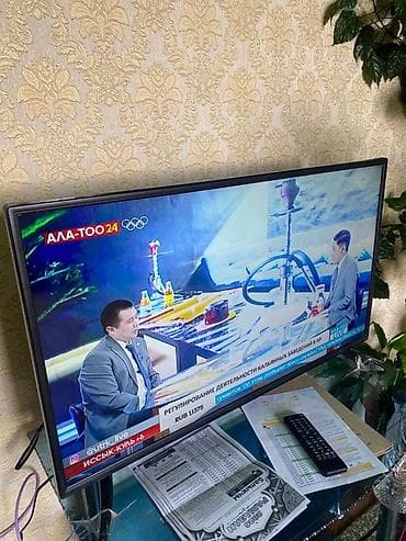 Другое ТВ и видео: LED-телевизор с тонкими рамками, диагональ около 40–43 дюймов — 1