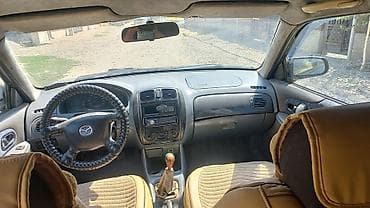 mazda kronos: Mazda Familia: 2002 г., 1.5 л, Механика, Бензин, Универсал — 7