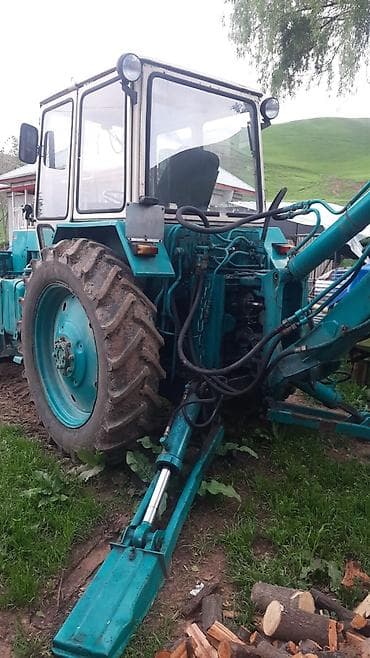 каток траншейный: Фронтальный погрузчик на трактор с задним экскаваторным оборудованием — 2