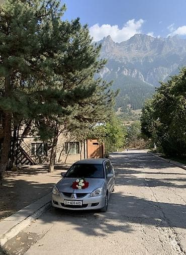 mitsubishi challenger: Mitsubishi Lancer: 2004 г., 1.6 л, Автомат, Бензин, Универсал — 7