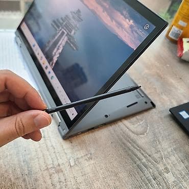 hyper x: Ноутбук Lenovo ThinkPad в корпусе серого цвета, оснащенный процессором — 8