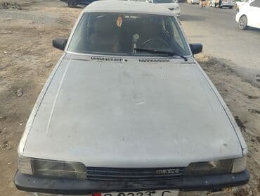 аккумулятор мотоцикла: Mazda 626: 1983 г., 2 л, Механика, Бензин, Седан — 7