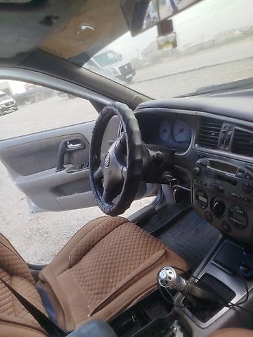 сомо тест: Nissan Primera: 2001 г., Механика, Бензин, Седан — 4