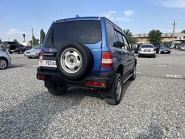 spark 2012: Mitsubishi Pajero Pinin: 2002 г., 1.8 л, Автомат, Бензин, Внедорожник — 6