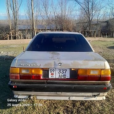 гараж тунгуч: Audi 100 (C3), седан, золотистый цвет кузова. Полноразмерный — 3