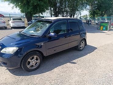 боковой: Mazda Demio: 2004 г., 1.5 л, Автомат, Бензин, Хэтчбэк — 2