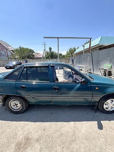 2 4 д: Daewoo Nexia: 2003 г., Механика, Бензин, Седан — 2