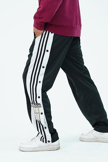 джинсы килоты: Спортивные штаны adidas с кнопками по бокам. Сэкон-Хенд — 4