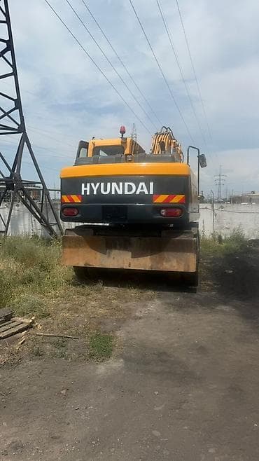 Экскаватор, Hyundai, 2013 г., Колесный