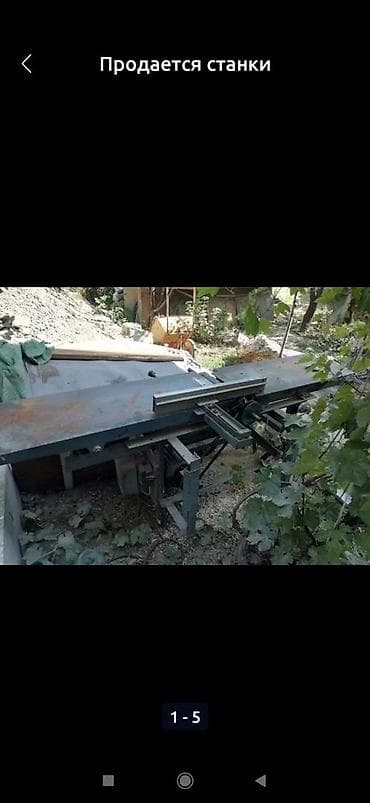 Торцовочно-раскроечный деревообрабатывающий станок с продольной