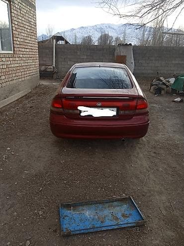 Mazda Cronos: 1993 г., 2 л, Механика, Седан