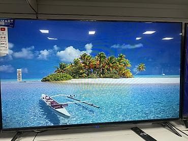 android 4: Телевизор VASIN, диагональ около 55–58". Ключевые особенности: - — 2