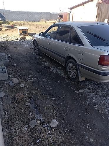 daf 2001: Mazda 626: 1989 г., 2 л, Механика, Бензин, Седан — 4