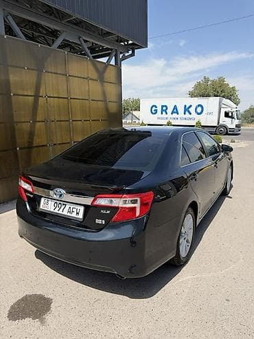 byd e2 2023: Toyota Camry: 2012 г., 2.5 л, Вариатор, Гибрид, Седан — 5