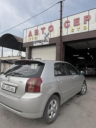 Транспорт: Toyota Corolla: 2004 г., 1.4 л, Кол менен иштөөчү, Хетчбек — 6