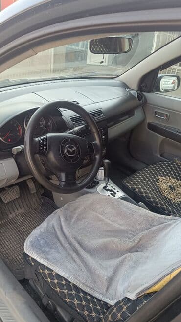 аксессуар для авто: Mazda Demio: 2003 г., 1.5 л, Автомат, Бензин, Хэтчбэк — 12