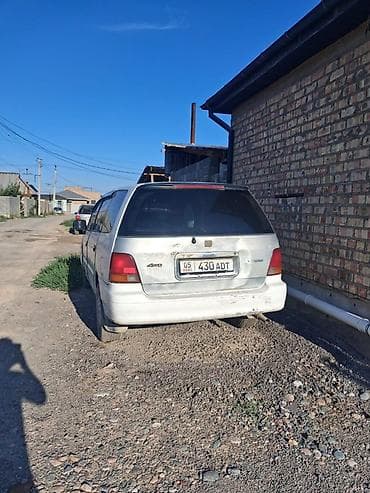 сидения трактор: Honda Odyssey: 1996 г., 2.2 л, Автомат, Бензин, Минивэн — 5
