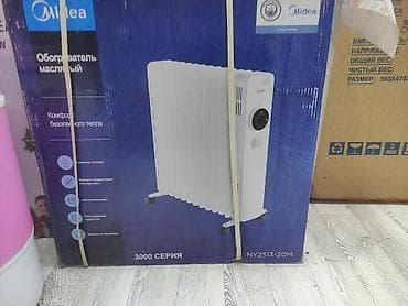 table fan: Масляный обогреватель Midea, серия 3000 (модель NY2513-20M) - — 1