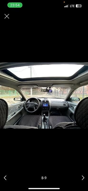 Унаа сатуу: Mazda 323: 1999 г., 1.5 л, Кол менен иштөөчү, Бензин, Хетчбек — 6