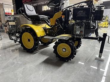 немецкий трактор: Мини-трактор (мотоблок с прицепным сиденьем) жёлтого цвета Описание — 2