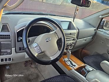 Infiniti QX56: 2006 г., 5.6 л, Автомат, Газ, Внедорожник