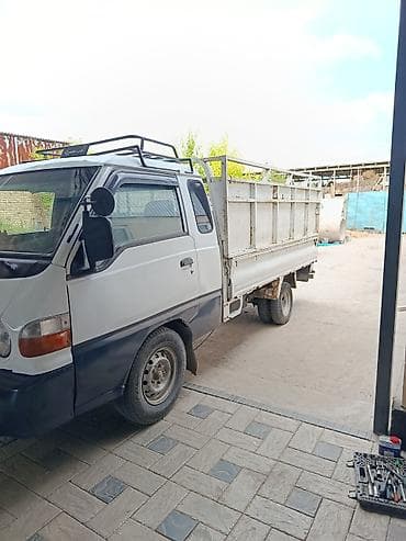 тез арада: Hyundai Porter: 2000 г., Кол менен иштөөчү — 2