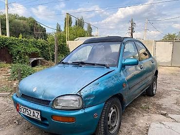 Mazda 121: 1992 г., 1.3 л, Механика, Бензин, Седан