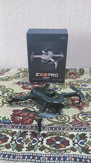 Квадрокоптер Z102 Pro (14+) Компактный складной дрон для аэросъёмки и at lalafo.kg Квадрокоптер Z102 Pro (14+) Компактный складной дрон для аэросъёмки и