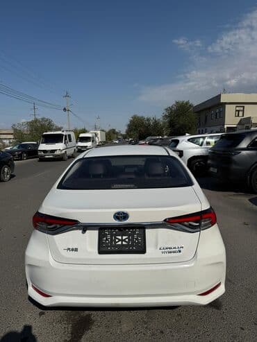 тайота кронус: Toyota Corolla: 2022 г., 1.8 л, Автомат, Гибрид, Седан — 3