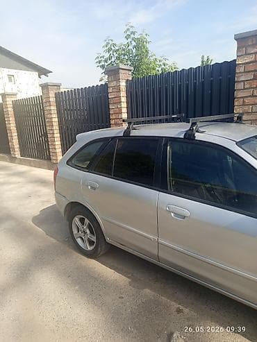 dot 4: Mazda 323: 2002 г., 1.6 л, Механика, Бензин, Универсал — 3