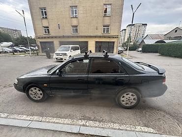 Mazda 626: 1995 г., 1.8 л, Механика, Бензин — 4