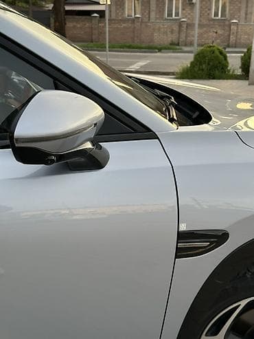 зарядка на электрокар: Электрический кроссовер (серебристый металлик) NETA L плагин бензин — 4