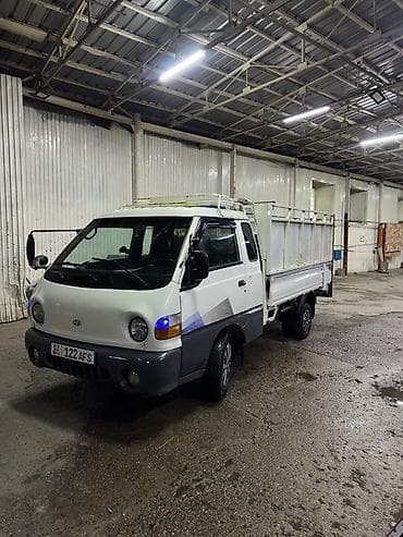 Грузовой мини‑самосвал Hyundai Porter (тип кузова — бортовой — 3