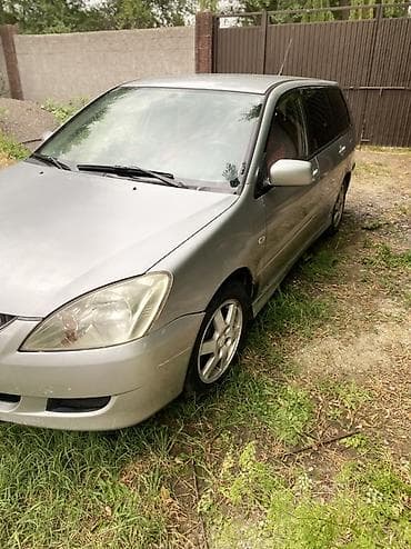 мтз 9: Mitsubishi Lancer: 2003 г., 1.6 л, Механика, Газ, Универсал — 3